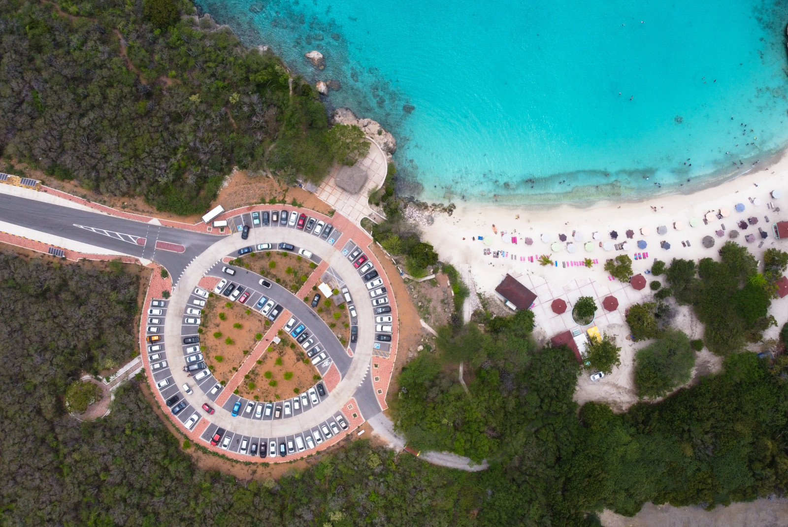 Aerial view of blue waters and white sand at Kenepa Beach in Curacao